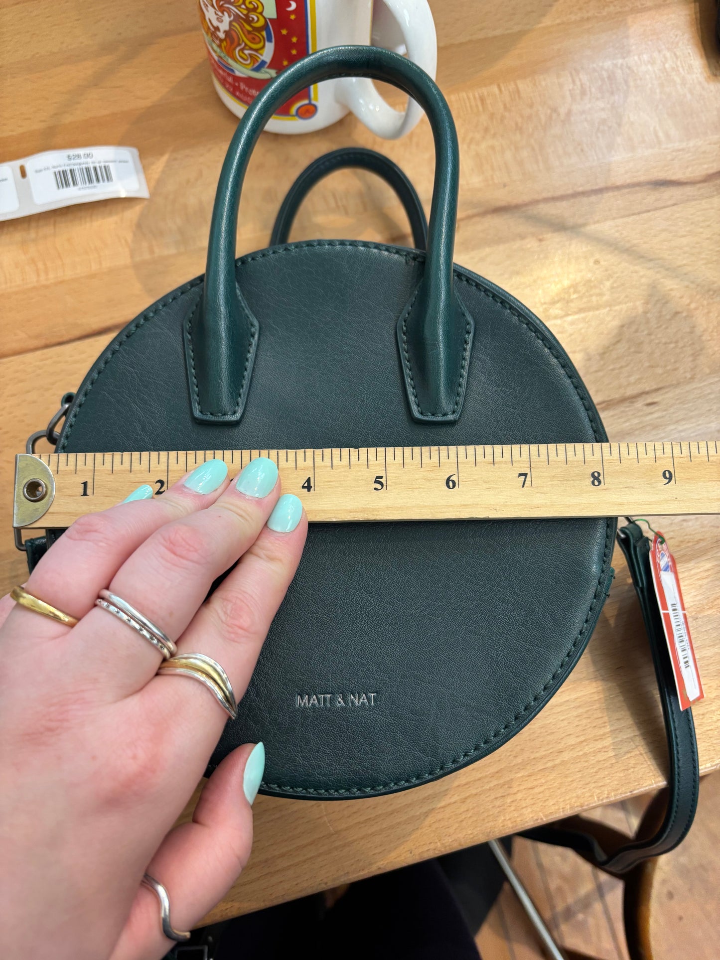 Dark green round Mat and Nat purse - cross body