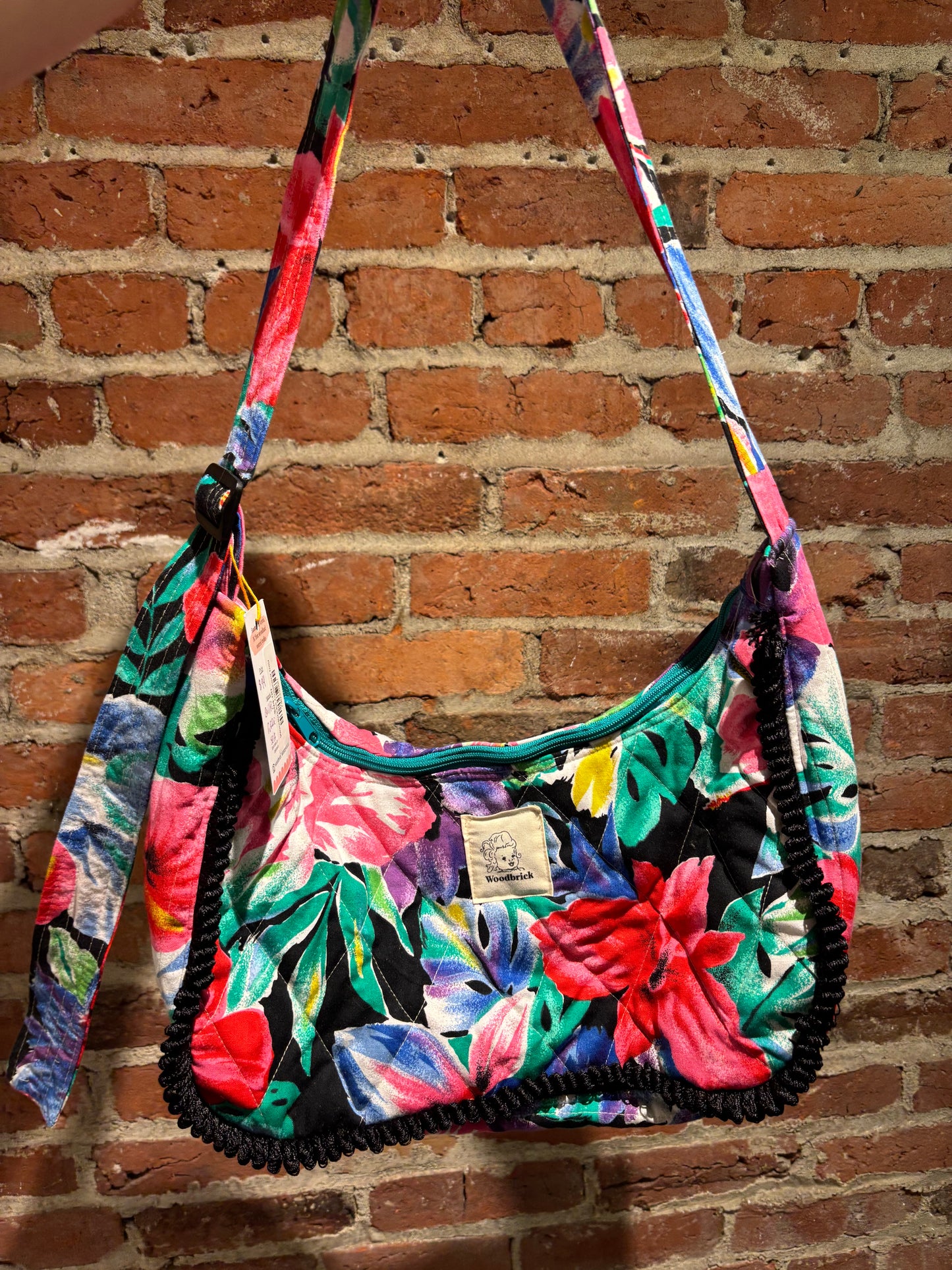 Woodbricks quilted ruffle shoulder crescent bag