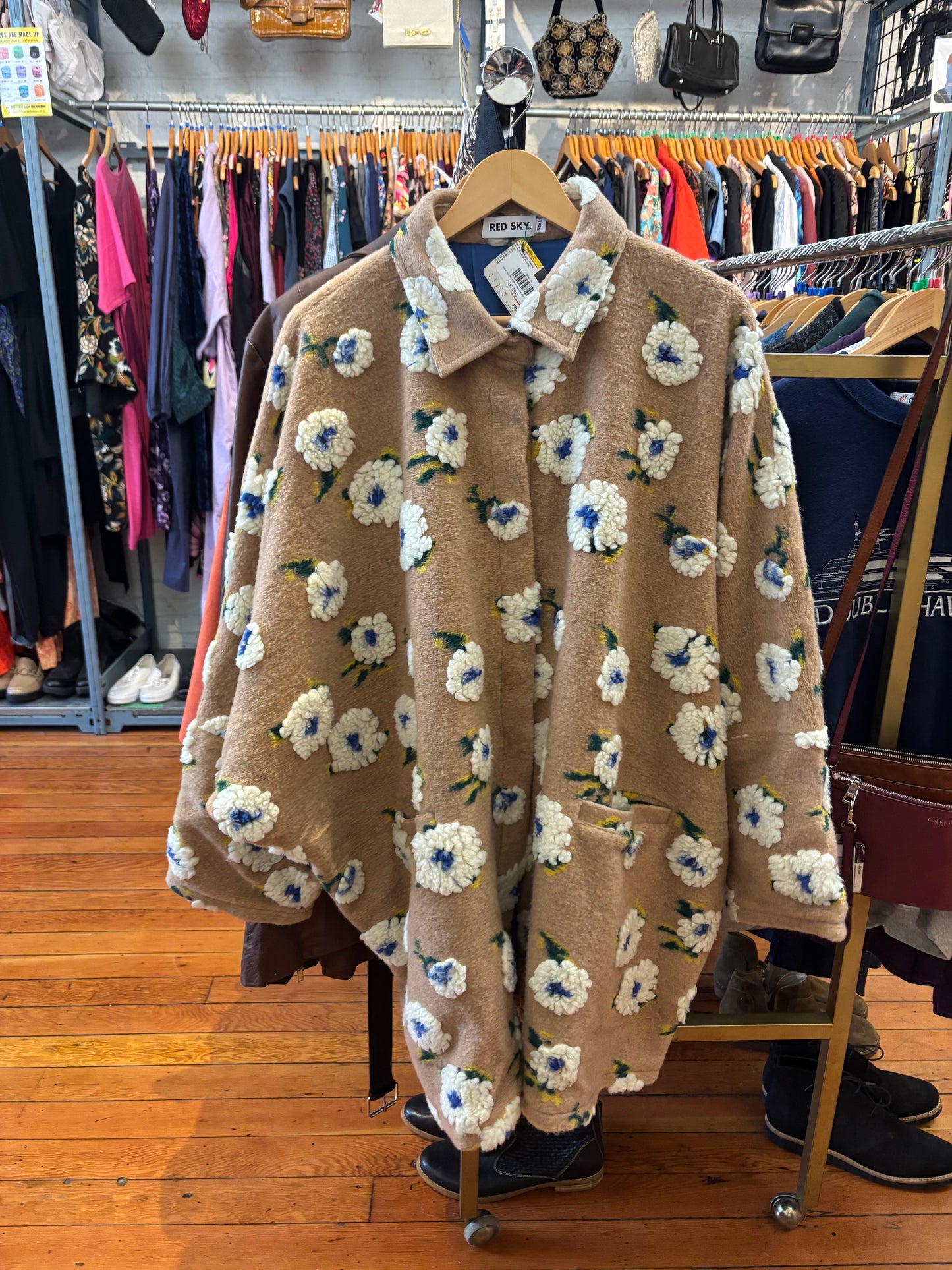 size 1 puffy sand with white flowers Red Sky  jacket