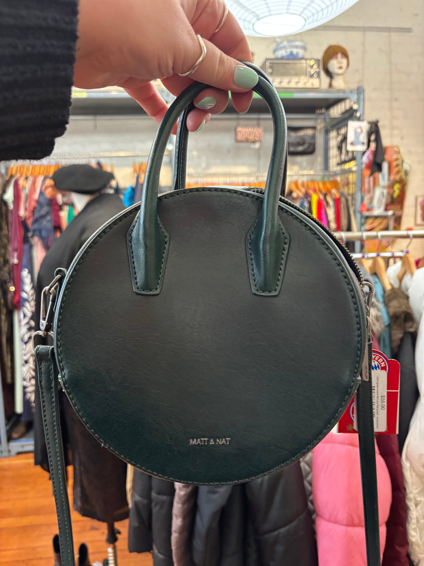 Dark green round Mat and Nat purse - cross body