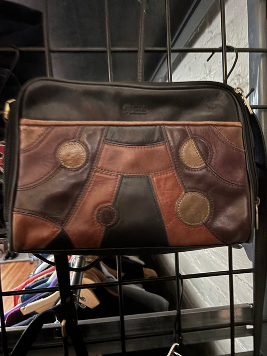 small black leather with brown circles vintage Opale purse