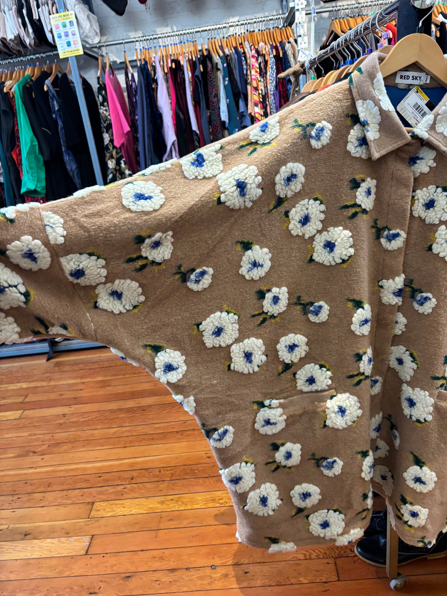 size 1 puffy sand with white flowers Red Sky  jacket