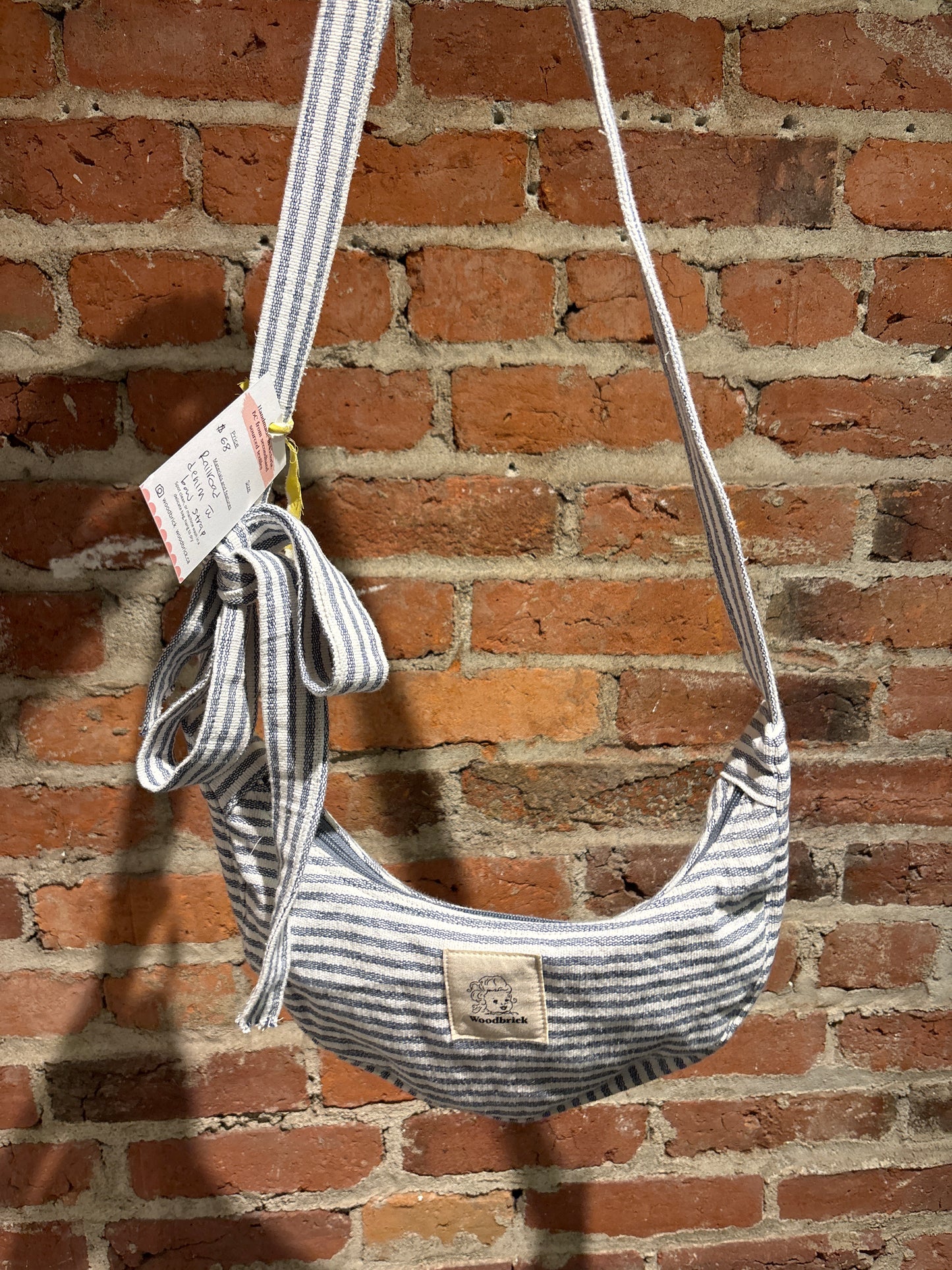 small crescent railroad denim with bow strap Woodbricks MAKER