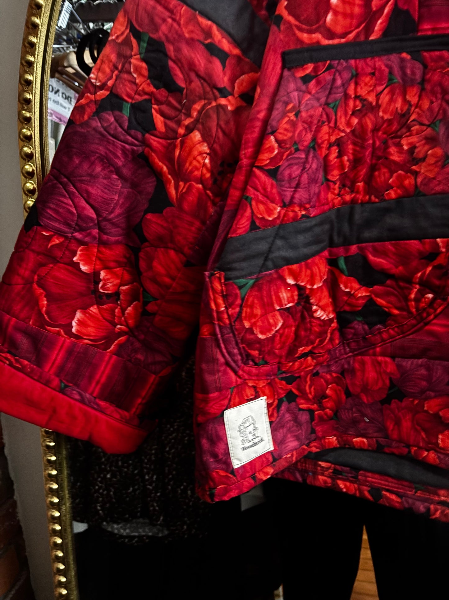 size XL quilted jacket by Woodbrick - wide arm and hem with hood, red tulips